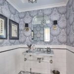Powder room with blue and white patterned wallpaper