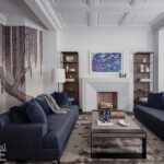Living room in a historic Boston home with blue couches and contemporary touches