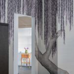 A jib door papered with de Gournay wallpaper