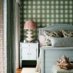 Guest room with green and white buffalo check wallpaper