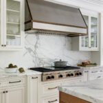 Range with a custom metal hood
