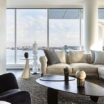 Living room with a harbor view designed by Cory Gans