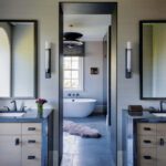 Primary bathroom with steel and wood cabinetry