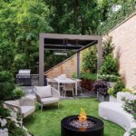 Stylish outdoor entertaining area with comfortable seating, natural elements, and a peaceful ambiance for relaxation.