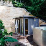 Tranquil sauna retreat with warm wood interiors, soft lighting, and a calming atmosphere for ultimate relaxation.