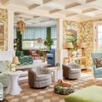 Pattern-filled living room with floral wallpaper and coffered ceiling