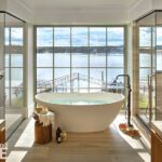Spa-like bathroom with freestanding tub and floor-to-ceiling windows