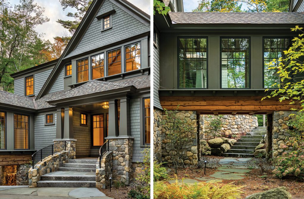 Shingle-style home with stone foundation, front porch, and warm interior lighting at dusk.